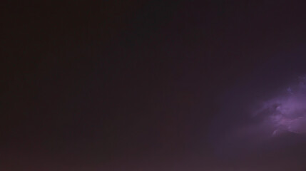Naklejka premium dark cloud wallpaper with ray light focus