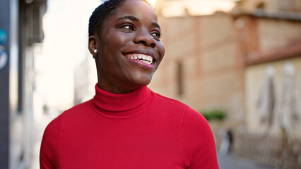 African american woman smiling confident standing at street