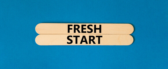Fresh start and motivational symbol. Concept words Fresh start on beautiful wooden stick. Beautiful...