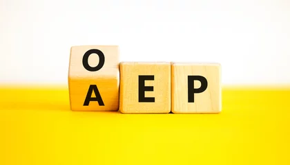 Deurstickers AEP or OEP symbol. Concept words AEP annual enrollment period OEP open enrollment period. Beautiful yellow table white background. Medical annual or open enrollment period concept. Copy space. © Dzmitry