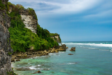 Stunning seascapes from the Uluwatu Temple, a Balinese Hindu sea temple (Pura Segara), South Kuta, Badung, Southern Bali, Indonesia