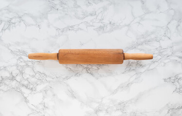 Rolling pin on a marble counter, horizontal position