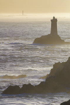 the rough and rocky coastline of Brittany with the famous point de Raz , France
