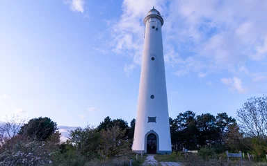 Wandcirkels tuinposter The White lighthouse of the wadden island 'Schiermonnikoog' in Friesland, the Netherlands © Daniel Doorakkers