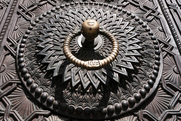 Iron door of Matenadaran Museum on sunny day. Yerevan, Armenia.