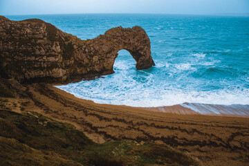 Rock arch of Durdle Door in Lulworth, UK