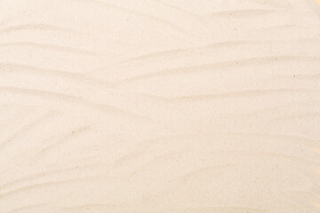 Sand on beach as background, top view