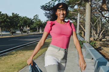 Beautiful girl dancing while walking on the street, Concept of lifestyle, dance and urban culture.