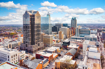 Aerial view of Raleigh, North Carolina skyline on a sunny day. - obrazy, fototapety, plakaty