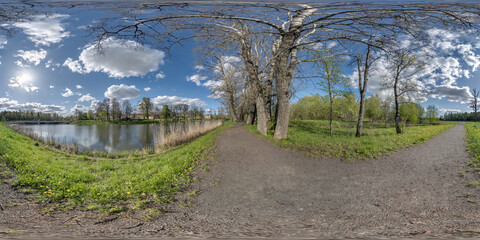 full seamless spherical 360 hdri panorama view on pedestrian walking path among poplar grove with...