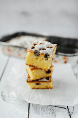 Beautiful and delicious homemade cherry cake on rustic white wooden table. Sweet food concept.