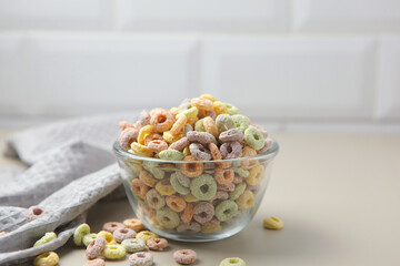 Multicolored corn rings for breakfast on the table