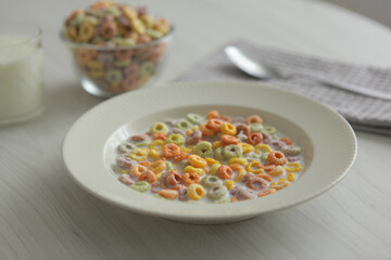 Multicolored corn rings for breakfast on the table