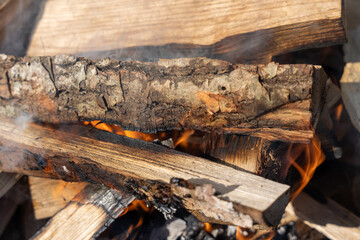 BBQ grill with flaming firewood