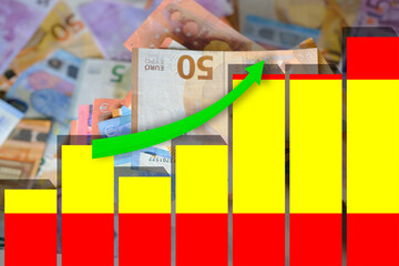 paper euro banknotes, Spain flag on textured background of graph, concept banking, stability national currency, monetary progress, growth in production and business activity, economic stability
