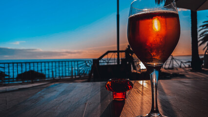 Surreal Sea View: A Serene Restaurant Escape with a Glass of Beer