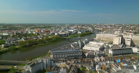 Aerial landscape of the city of Nantes, France. Birds eye of the city center and rooftops. Aerial view of Nantes town, one of main north-western French metropolitan agglomerations