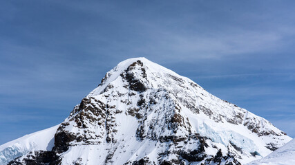 Snow-covered Swiss Jungfrau and surrounding mountains