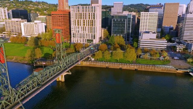 Aerial Panorama of Downtown Portland, Oregon just after sunrise at the Hawthorne Bridge, Notable Buildings, and Graceful Camera Techniques