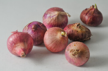 red onions on a white background