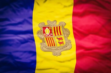 Andorra flag on a fabric wavy background. Wavy flag of Andorra fills the frame.