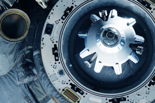 Docking spacecraft in outer space. Elements of this image furnished NASA.