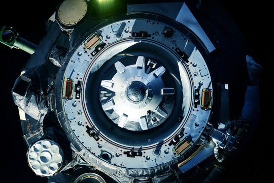 Docking spacecraft in outer space. Elements of this image furnished NASA.