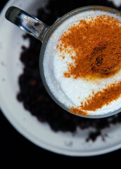 cup of cappuccino with spoon