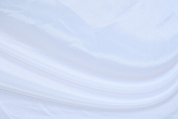 Obraz premium Smooth elegant white silk or satin luxury cloth texture can use as wedding background. Luxurious background design