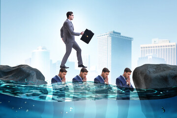 Inequal competition concept with businessman walking on heads
