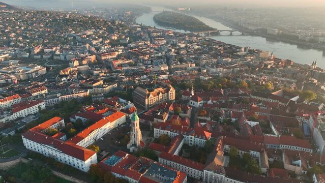 Aerial view of Budapest city skyline. Church of Mary Magdalene of Buda, one of the oldest churches of the Varkerulet District, Buda Castle District. Hungary