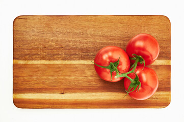 tomatoes on cutting board