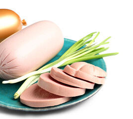 Plate of tasty boiled sausage with slices and green onion on white background © Pixel-Shot
