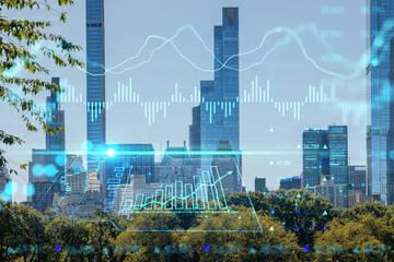 Green lawn at Central Park and Midtown Manhattan skyline skyscrapers at day time, New York City, USA. Forex graph hologram. The concept of internet trading, brokerage and fundamental analysis
