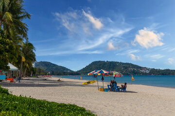 Fototapeta na wymiar Patong Beach Phuket Thailand nice white sandy beach clear blue and turquoise waters and lovely blue skies with Palms tree sunset sunrise