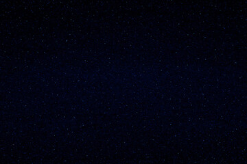 Starry night sky.  Glowing stars in the night.  Dark blue galaxy space background. 