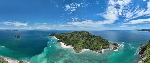 Isla Tortuga is a small uninhabited island off the coast of Costa Rica, known for its white sandy beaches, crystal clear waters, and snorkeling opportunities.