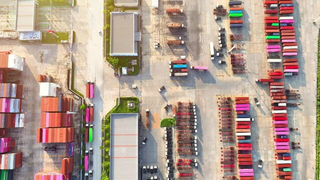 The main function of a container yard is to facilitate the movement of cargo containers between different modes of transportation. Are typically located near ports or other transportation hubs. 4K
