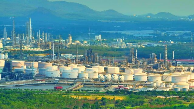 One of the most noticeable aspects of the refinery and petrochemical industry is the presence of steam and smoke. Steam is used extensively in these industries. Energy and air pollution concept. Drone