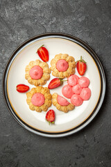 top view delicious sugar cookies with strawberry jelly on grey background jelly fruits cake sugar sweet biscuit