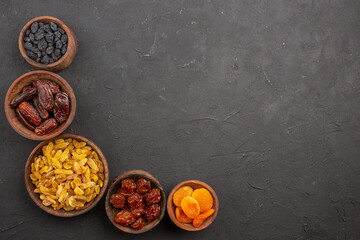 top view dried raisins on grey background raisin dry fruit food