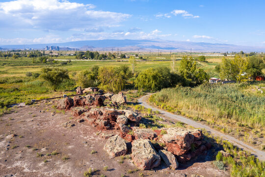 Aerial view of ancient observatory in Metsamor Archeological Site on sunny summer day. Taronik, Armavir Province, Armenia.