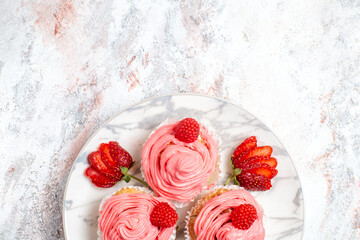Fototapeta na wymiar top view pink strawberry cakes with fresh berries on a white background fruit tea cake biscuit sweet cookie