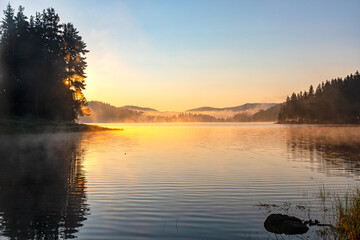 Fototapeta premium Sunrise at Shiroka Polyana Dam, Western Rhodopes, Bulgaria