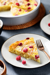 Fresh baked sweet Filo Pastry pie with raspberry and powdered sugar.