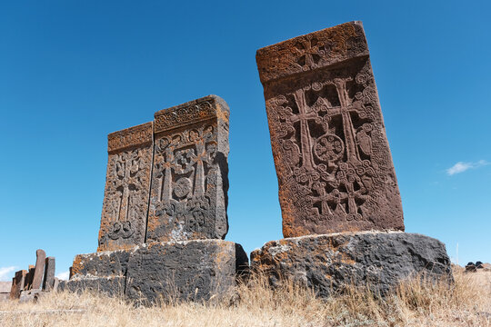 Medieval khachkars of Noratus Cemetery on sunny summer day. Noratus village, Gegharkunik Province, Armenia.