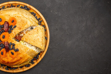 top view shakh plov delicious rice meal cooked inside round dough with raisins on grey background rice dinner cooking dough meal