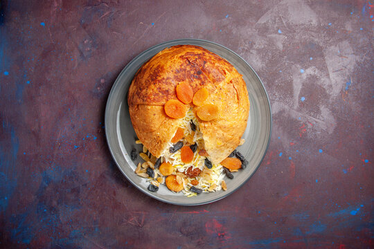 top view tasty shakh plov with raisins on a dark background cooking rice food meal dough