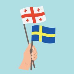 Flags of Georgia and Sweden, Hand Holding flags