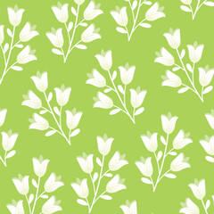 White flowers on a green background
